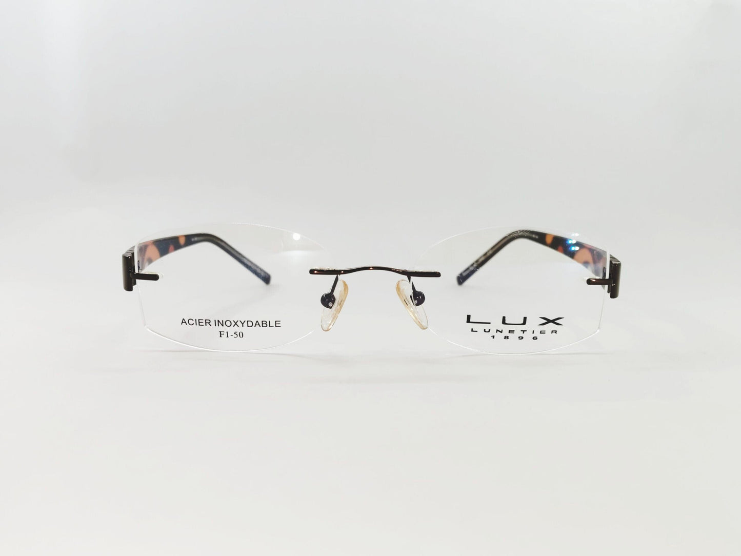 iDom Eyeglasses Rimless Oval Specs For Women 124858