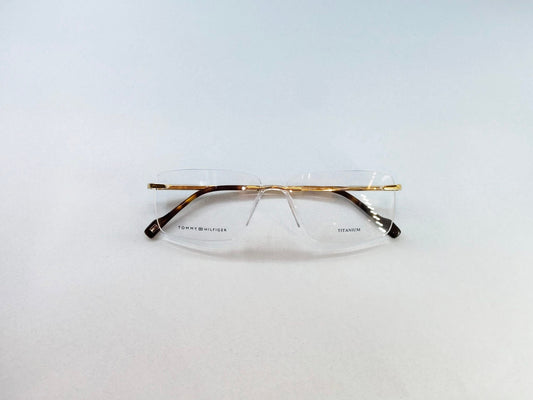Tommy Hilfiger Eyeglasses Tommy Hilfiger Rimless Frame for Men & Women 213454