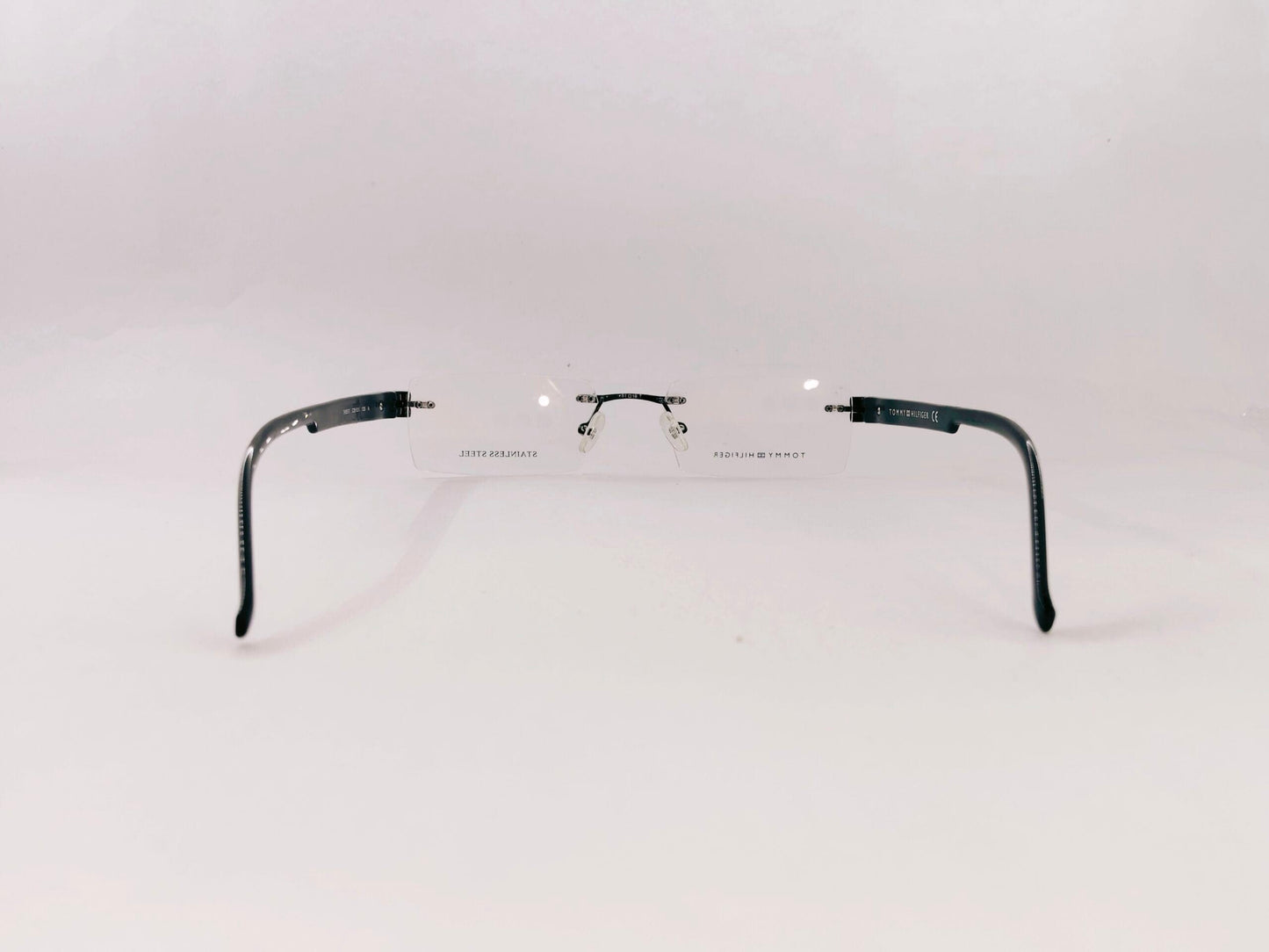 Tommy Hilfiger Eyeglasses Tommy Hilfiger Rimless Rectangle Specs For Men & Women 166315