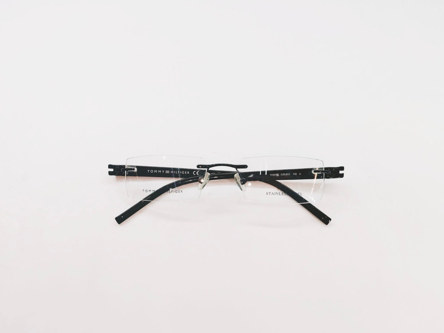 Tommy Hilfiger Eyeglasses Tommy Hilfiger Rimless Rectangle Specs For Men & Women 166315