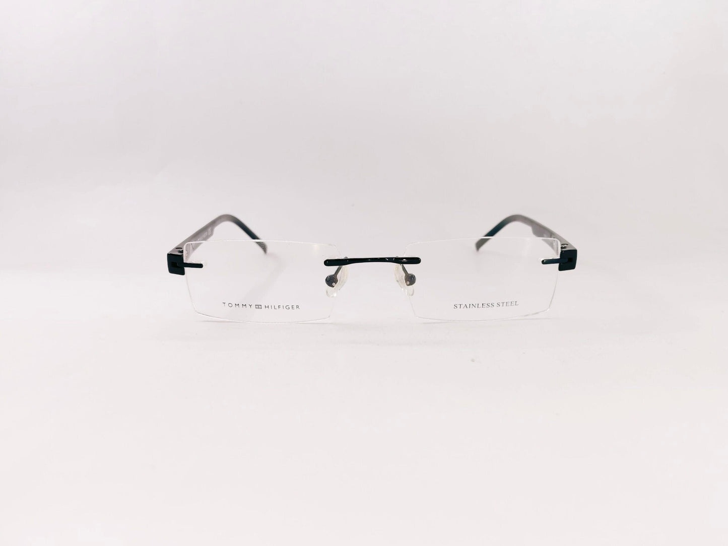 Tommy Hilfiger Eyeglasses Tommy Hilfiger Rimless Rectangle Specs For Men & Women 166315