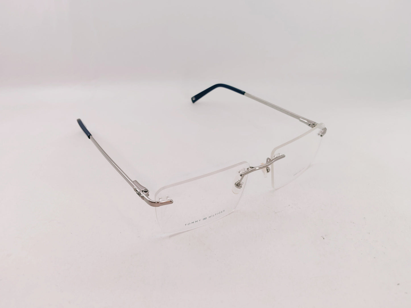 Tommy Hilfiger Eyeglasses Tommy Hilfiger Rimless Rectangle Specs For Men & Women 272462