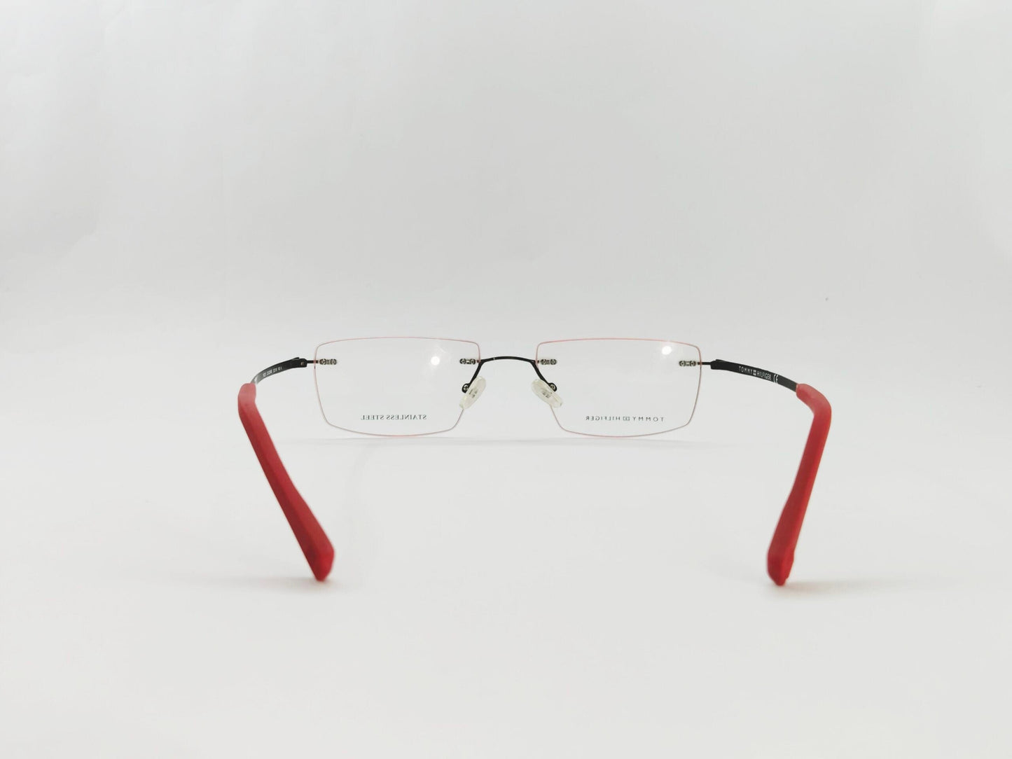 Tommy Hilfiger Eyeglasses Tommy Hilfiger Rimless Rectangle Specs For Men & Women 621873