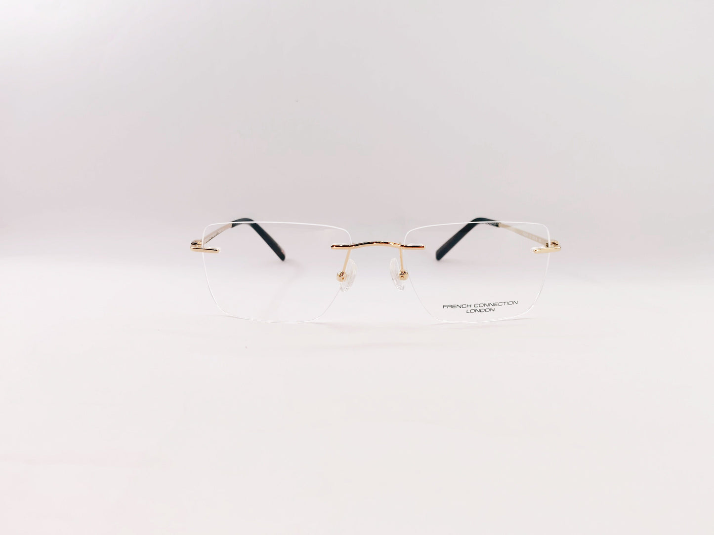French Connection Eyeglasses French Connection Rimless Rectangle Specs For Men 117061
