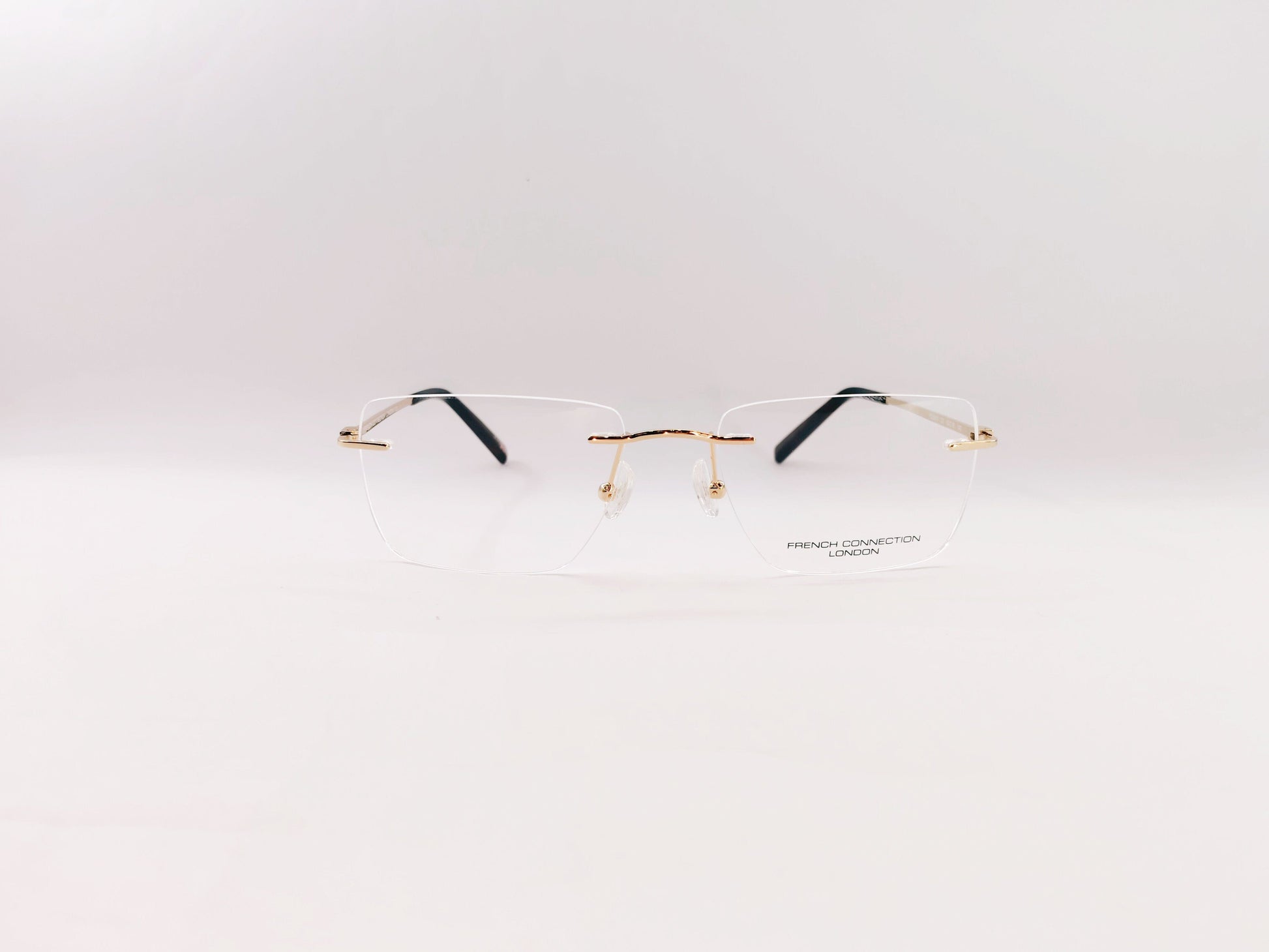 French Connection Eyeglasses French Connection Rimless Rectangle Specs For Men 117061