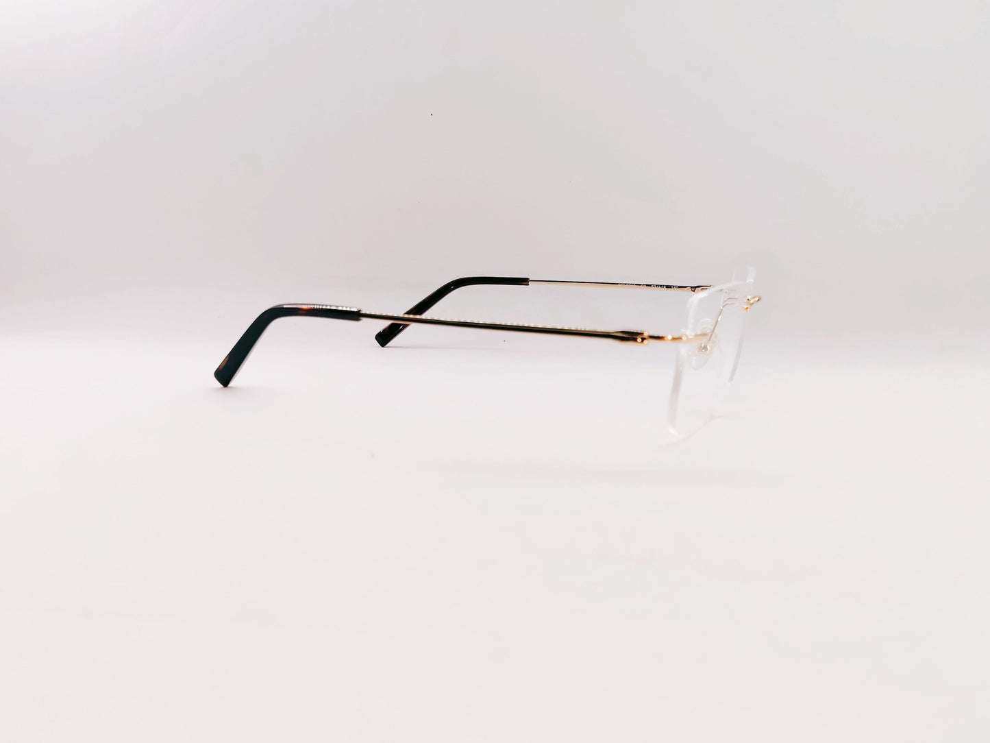 French Connection Eyeglasses French Connection Rimless Rectangle Specs For Men 117061