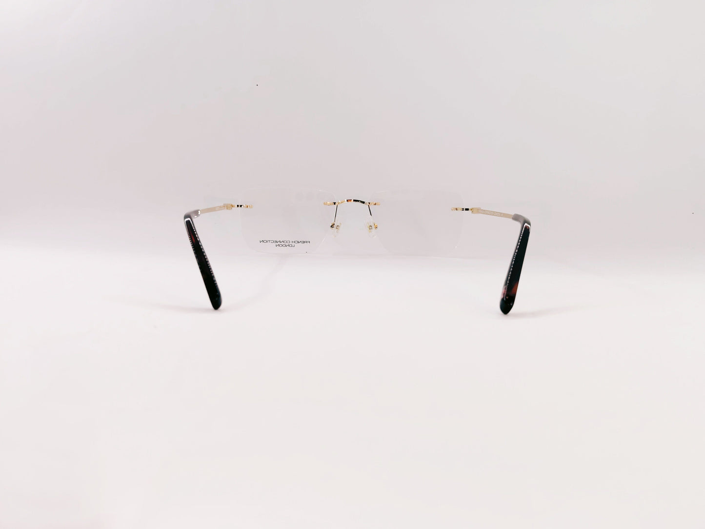French Connection Eyeglasses French Connection Rimless Rectangle Specs For Men 117061