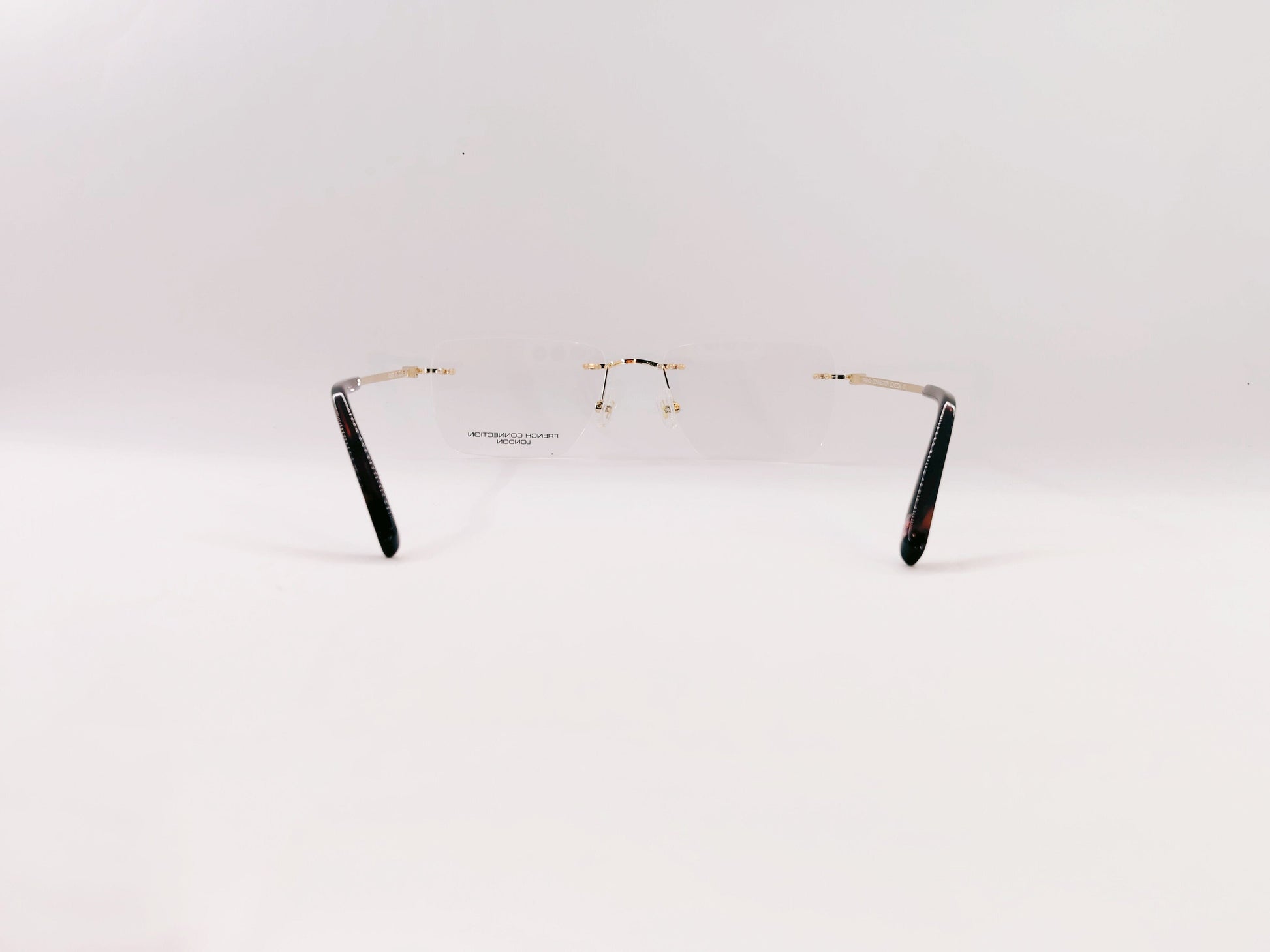 French Connection Eyeglasses French Connection Rimless Rectangle Specs For Men 117061