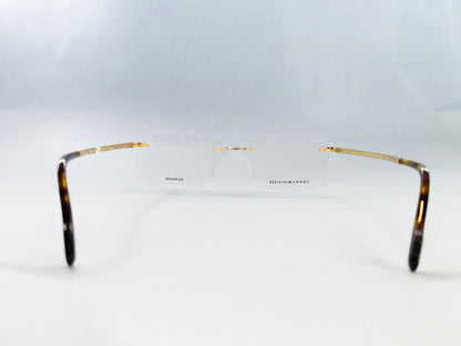 Tommy Hilfiger Eyeglasses Tommy Hilfiger Rimless Frame for Men & Women 213454